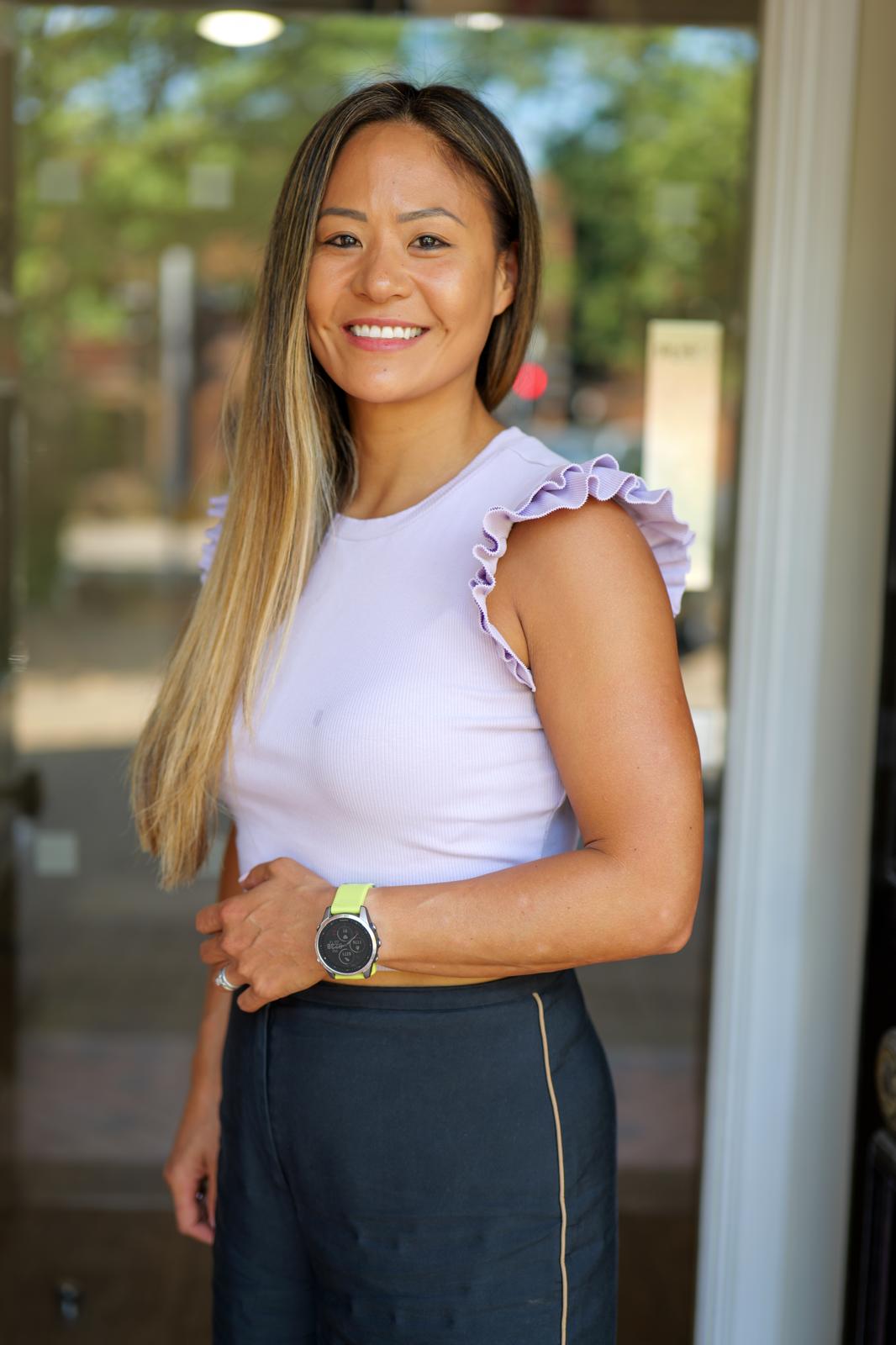 Betsy Matthews smiling in natural daylight